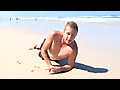 ManSurfer A sun bronzed Lifeguard