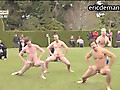 Rugby team performing naked Haka